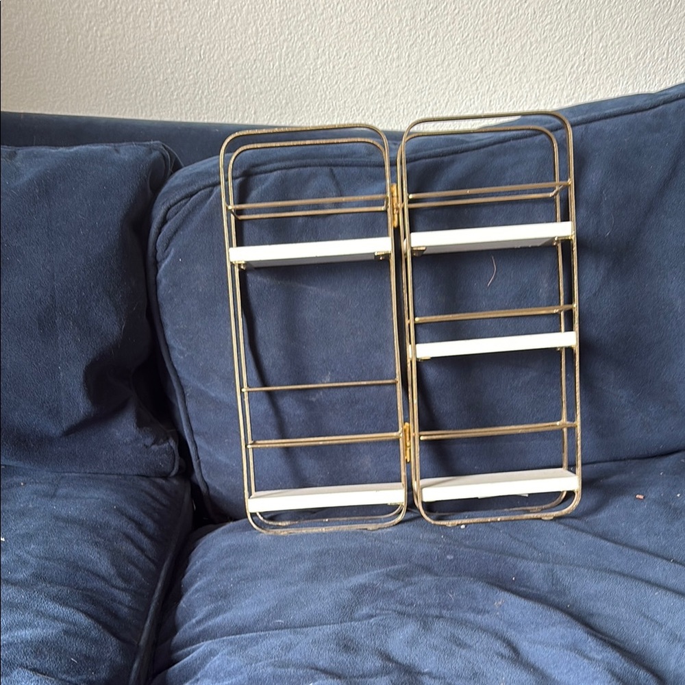Gold and White Metal Wall Shelf
